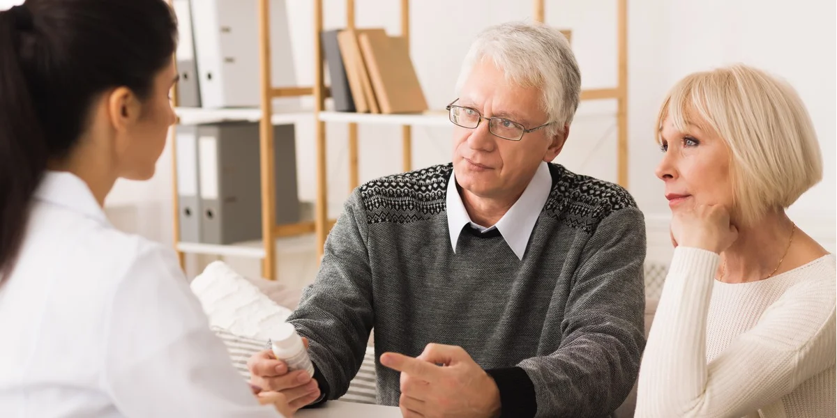 Oesophageal cancer patient talking with doctor